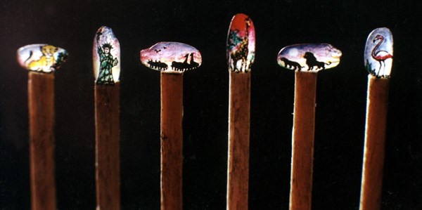 Engraving and painting on a Grain of Rice