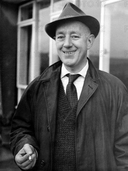 Alec GUINNESS outside his home, Petersfield 1959