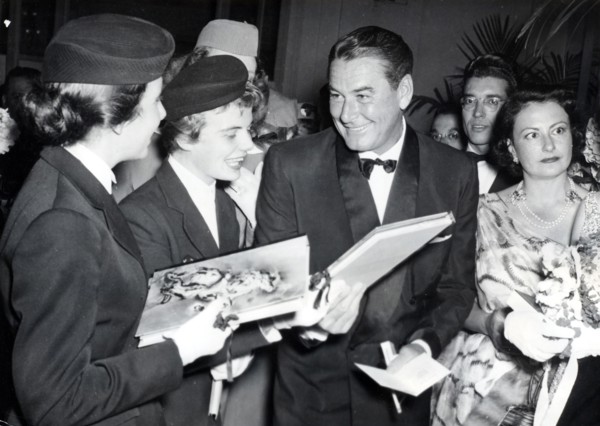 Errol FLYNN without a beard at a ball, Deauville 1954