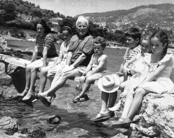 Charlie CHAPLIN with his family, 1957