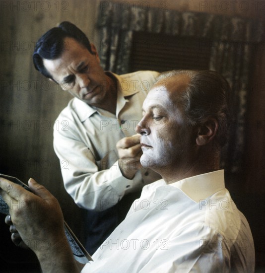 Curd JÜRGENS as a clown in 'The Blue Angel', is made up