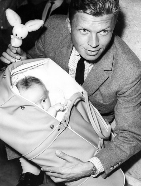 Hardy KRÜGER, with a baby in 1959