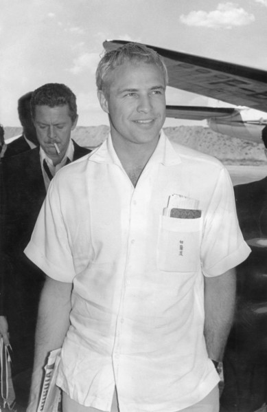 Marlon BRANDO, arriving at Madrid airport