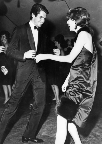 George HAMILTON dancing during a party, Los Angeles
