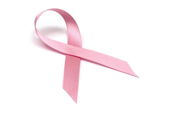 Pink ribbon signifying breast cancer symbol on white background