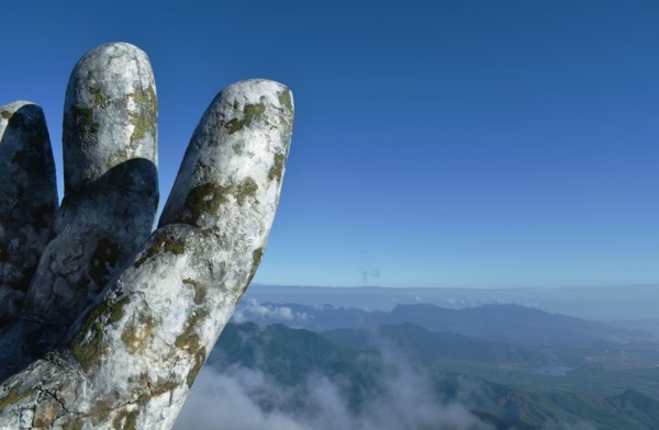 Danang Vietnam January 6, 2020 : giant hands holding bridge or golden bridge at Ba Na hills unique landmark in Vietnam