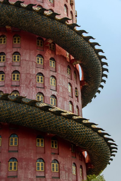 The part of pink tower with giant dragon at Wat SamPhran - Dragon temple, Nakhon Pathom, Thailand