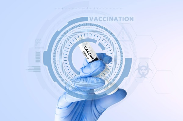 Syringe with the inscription "Vaccine". Coronavirus vaccination