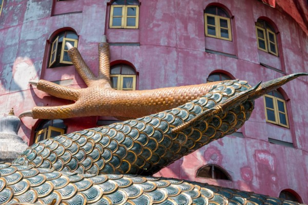 Nakhon Pathom, Thailand-February, 2020:Wat Samphran Dragon Temple in the Sam Phran District.Buddhist temple has a dragon wrapped around it.