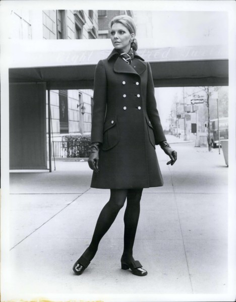 Jun. 15, 1969 - The little coat is still big news for Fall '69 from Originala, a brown double buttoned coat with lots of shaping has a regency collar and slanted patch pockets shoes by Pierre Cardin M...