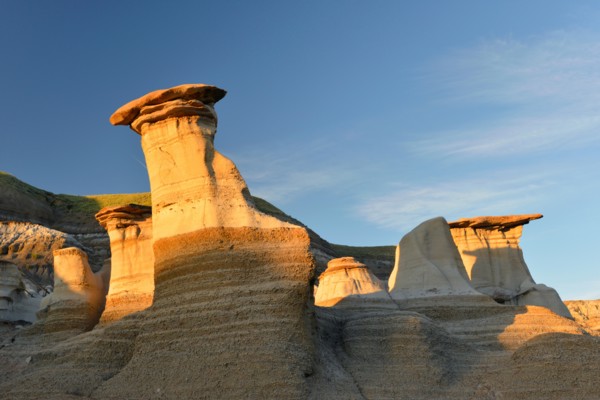 Geological formations known as 'hoodoos'; the result of erosion. Drumheller, Alberta, Canada.