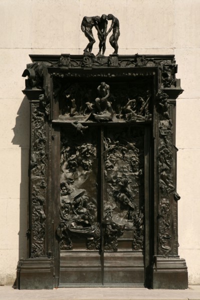The Gates of Hell (La Porte de l'Enfer) by French sculptor Auguste Rodin seen in the garden of The Musee Rodin in Paris, France.