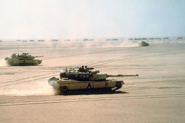 A US Army M-1A1 Abrams main battle tank from the 3rd Armored Division, moves across the desert into Kuwait during Operation Desert Storm February 15, 1991 in Kuwait.