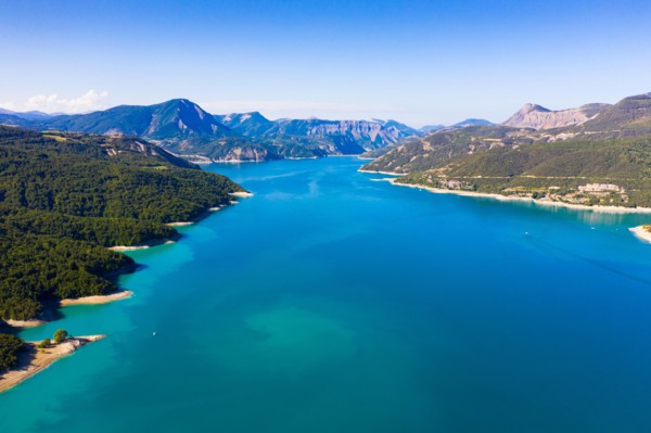 Panoramic scenic view of Serre-Poncon Lake and Alps in southeast France