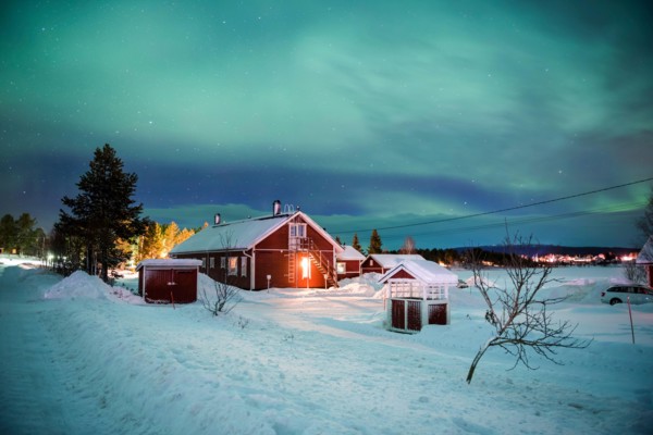 Northern Lights (aurora borealis) over Akaslompolo, a small town in Finnish Lapland, inside Arctic Circle in Finland