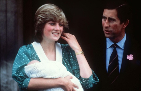 Diana, Princess of Wales, wearing her favourite maternity dress, with newly-born baby Prince William and the Prince Charles, Prince of Wales in June 1982.