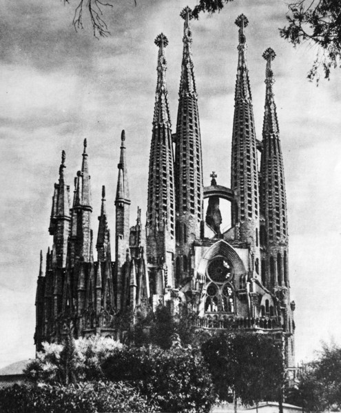 Photograph of the Basílica i Temple Expiatori de la Sagrada Família (Sagrada Família). A large Roman Catholic church in Barcelona, Catalonia (Spain), designed by Catalan architect Antoni Gaudí (1852–1...