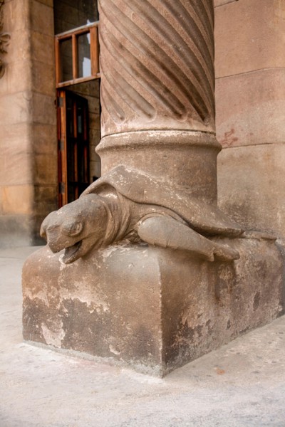 Barcelona, Spain - October 30, 2010: Detail of turtle statue decorating a column on Sagrada Familia nativity facade.