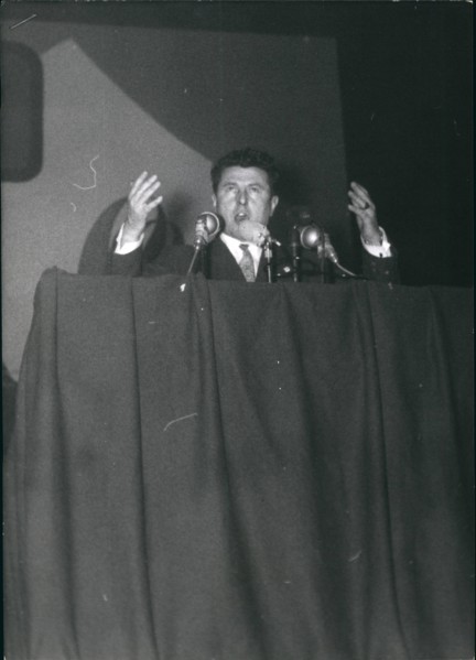 Jan. 01, 1956 - Poujade calls up partisans for mass meeting Pierre Poujade, leader of the new traders and Artisans party, held a mass meeting at the palais Des sports Paris, today. photo shows Poujade...