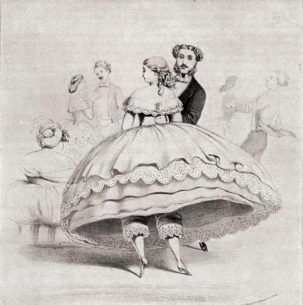 19th century lady wearing a crinoline at a ball.
