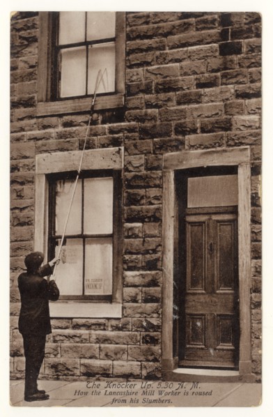Early 1900's postcard of Knocker Up man, known as the Knocker upper, (before alarm clocks) in Accrington, Lancashire, England, U.K. posted September 1918. The Knocker Upper woke up the mill workers in...