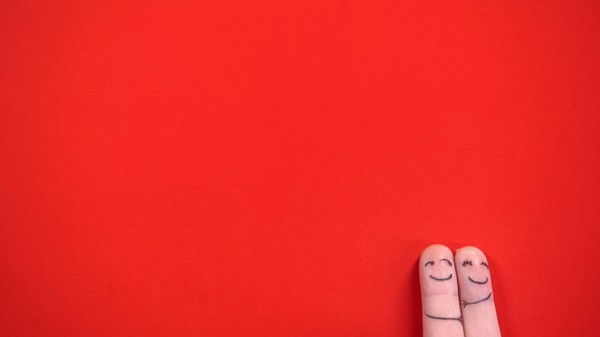 Happy finger face couple in love hugging, enjoying perfect date, love, top view
