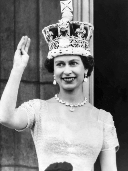 Queen Elizabeth II waves from the Buckingham Palace balcony after her Coronation on June 2, 1953 in London, England.