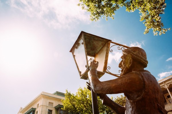 Statue Of Old Lamplighter, Igniting Lights On Streets Of Tbilisi - The Capital Of Georgia.