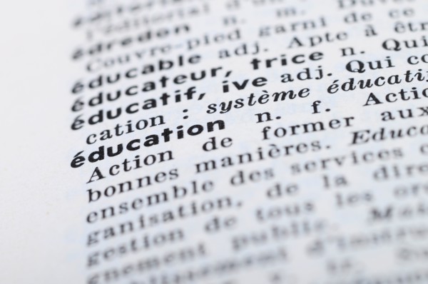 Close up of french dictionary at the word Education