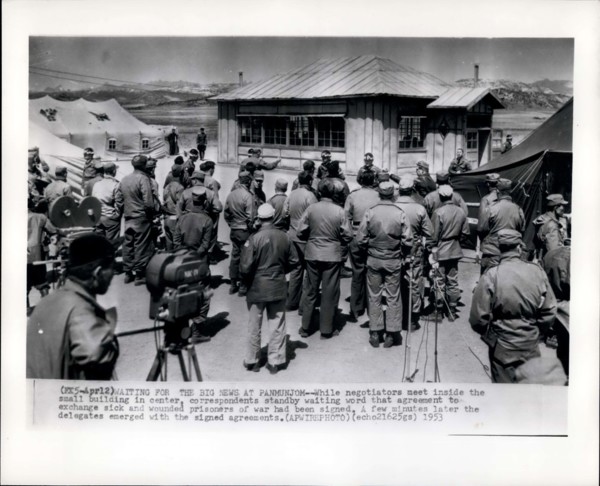 Apr. 12, 1953 - Waiting For The Big News At Panmunjom: While negotiators meet inside the small building in center, corresponded