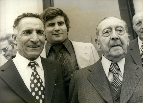 Jul. 16, 1976 - Alain Mimoun won the gold medal for the marathon at the Melbourne Olympics. Gaston Ragueneau won the silver medal for the 5000m at the 1900 Olympic Games in Paris. Standing in the back...