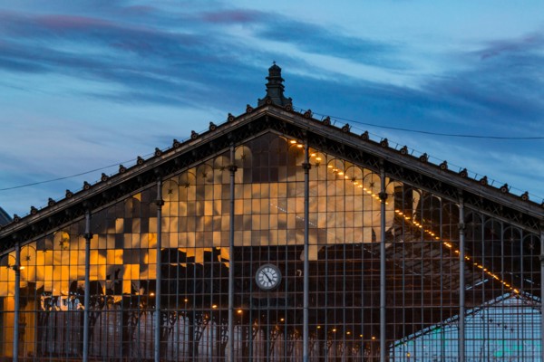 A reflection of sunset on the lattice window of the Nyugati Railway Station in Budapest