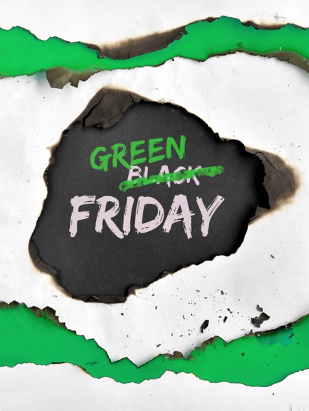 Green Friday concept, hole burned in white and green paper. Text "Black Friday Sale"  with word "Black" crossed out. Strikethrough or strikeout effect