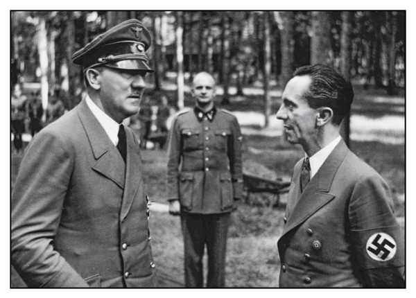 Adolf Hitler &  Reichminister Dr Joseph Goebbels with Nazi swastika armband at the Wolf’s Lair Headquarters.Poland. Hitler and Goebbels at the Wolf's Lair shortly after the beginning of Operation Barb...