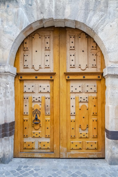 Paris, beautiful wooden door, typical window in the Marais