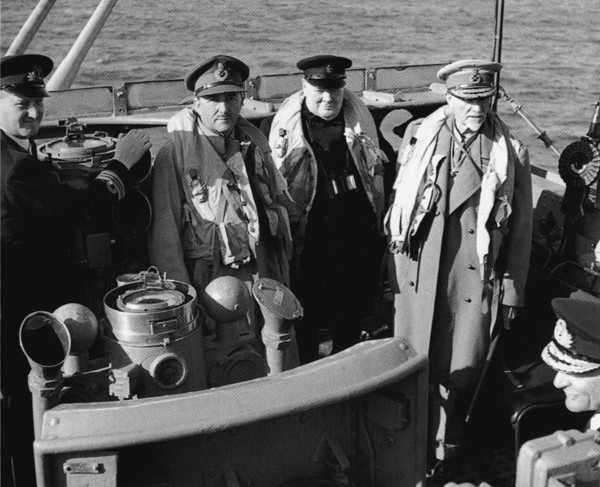 Churchill visiting the invasion beaches shortly after D-day.On his right Field Marshal Alan Brooke on left: Field Marshall Jan Smuts. 12th June 1944