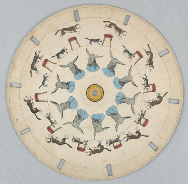 Phenakistiscope Disc with Cats and Donkey. Paper disc with a hole in the center, 10 rectangular perforations evenly spaced along perimeter for viewing.