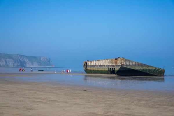 Remains of a Mulberry Harbour on the beach at Arromanches-les-Bains, Normandy, France.
