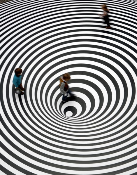 Three children play on the walkable disc 'Spazio ad Attivazione Cinetica' by the Italian artist Marina Appolonio at the entrance of the Schirn exhibition hall in Frankfurt, Germany, 16 February 2007. ...