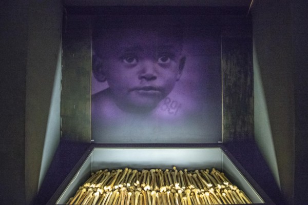 The remains of known victims of the 1994 Rwandan Genocide remain interred and on display inside of of the Kigali Genocide Memorial as a testament to t