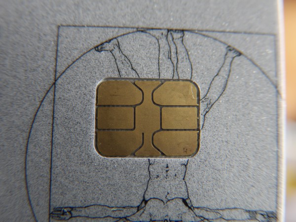 Closeup view (macro) of chip on a health insurance card used for saving data and as patient identification card