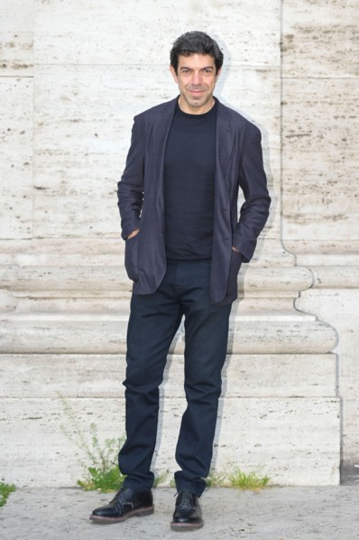 Pierfrancesco Favino poses for photographers at the photocall after the soloalcinema press conference on the steps of The Space Moderno cinema in Piazza della Repubblica.