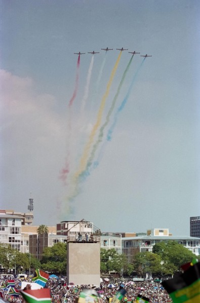 A display with coloured smoke by the Silver Falcons, aerobatic team of the South African Air Force, at Nelson Mandela's inauguration in Pretoria, 1994.
