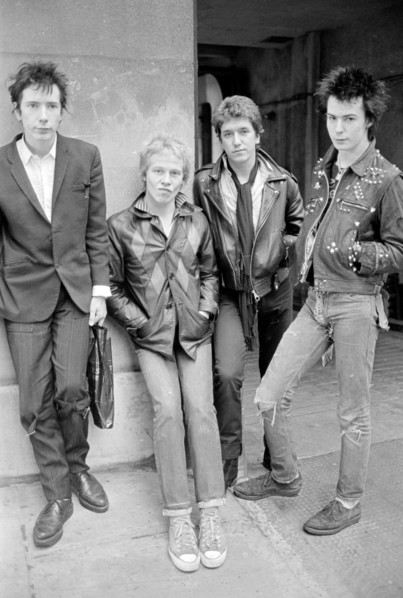 Sex Pistols punk rock band seen here in a London  Circa 1st May 1977
Left is Johnny Rotten - singer 
2nd left is Paul Cook - drums
3rd from left is Steve Jones - electric guitar 
Far right is Sid Vici...