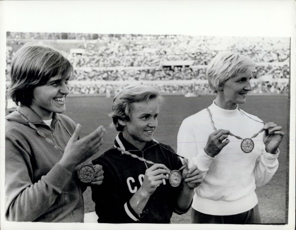 Sep. 01, 1960 - Olympic Games In Rome. Men's 100 Metres Heats Event. Photo shows V. Krepkina, of Russia, pictured in centre with her Gold Medal, after winning the Women's Olympic Long Jump in Rome yes...