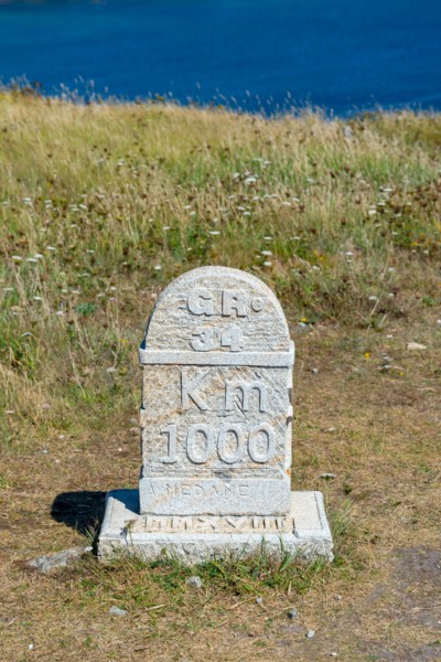 Hiking trail GR34 sign at the Pointe de Pen-Hir, a cape on Crozon peninsula in Finistère, Brittany, France