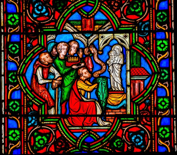 Worshiping Virgin Mary Jesus Christ Stained Glass Notre Dame Cathedral Paris France.  Notre Dame was built between 1163 and 1250