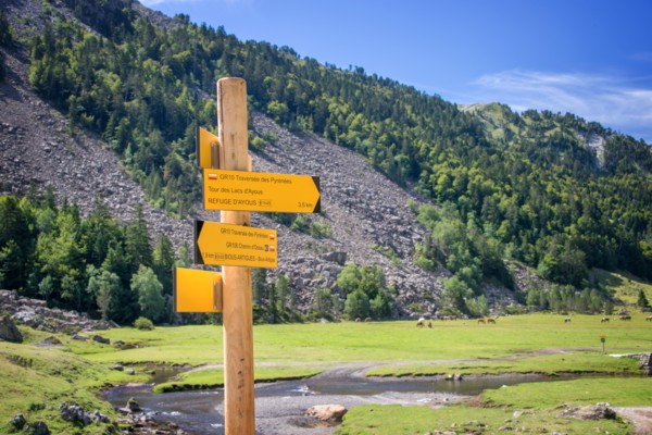Hiking direction sign in Ossau Valley, Pyrenees, France