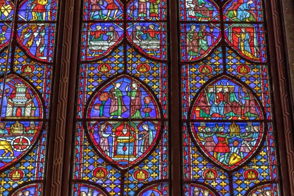 Detail of a stained glass window in Sainte-Chapelle , a royal chapel in the Gothic style, within the medieval Palais de la Cité , Paris