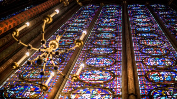 Paris, France-14 January, 2018: View interior of the famous Saint Chapelle, details of beautiful glass mosaic windows. Holy Chapel is a one of the mos